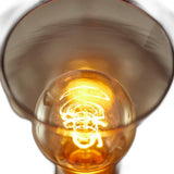 Smoked Glass Globe Shade With Vintage Edison Bulb And Matte Black Metal Arc Table Lamp