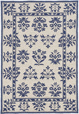 5' X 7' Sand Or Blue Floral Bordered Indoor Outdoor Area Rug
