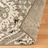 6' X 9' Ivory Beige And Light Blue Floral Stain Resistant Area Rug