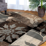 7' X 9' Beige And Gray Floral Power Loom Distressed Stain Resistant Area Rug