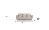 85" Beige Leather And Black Sofa