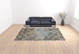 10' X 13' Brown Light Blue And Gray Distressed Diamond Area Rug