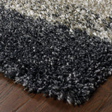 5' x 8' Black and Gray Geometric Shag Power Loom Area Rug