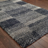 10' X 13' Charcoal Silver And Grey Geometric Shag Power Loom Stain Resistant Area Rug