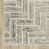 5' X 8' Ivory Beige Grey Brown Pale Blue And Charcoal Geometric Power Loom Stain Resistant Area Rug
