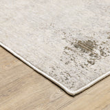 6' X 9' Beige And Ivory Abstract Power Loom Stain Resistant Area Rug