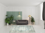 8' X 10' Grey Blue And Ivory Oriental Power Loom Stain Resistant Area Rug