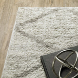 6' X 9' Grey And Ivory Abstract Shag Power Loom Stain Resistant Area Rug