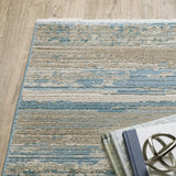 2' X 8' Blue And Ivory Abstract Power Loom Runner Rug With Fringe