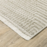 6' x 9' Beige and Ivory Geometric Power Loom Area Rug