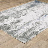 5' X 7' Gray And Ivory Abstract Printed Stain Resistant Non Skid Area Rug