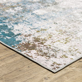 4' X 6' Ivory And Blue Abstract Printed Stain Resistant Non Skid Area Rug