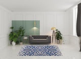 7' X 10' Blue Taupe And Ivory Ikat Distressed Area Rug