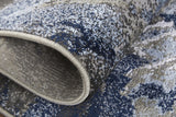 7' X 10' Blue Gray And White Abstract Area Rug