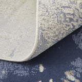 9' X 12' Blue Orange And Ivory Abstract Power Loom Area Rug