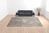 12' X 15' Tan Ivory And Blue Geometric Power Loom Distressed Area Rug