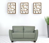 57" Pale Green Leather And Black Love Seat
