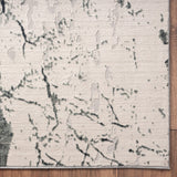 8' Ivory Abstract Area Rug