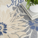 5' x 7' Cream Floral Power Loom Distressed Area Rug