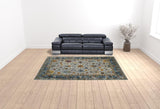 9' x 12' Blue and Orange Floral Power Loom Area Rug