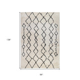 7' x 9' Gray and Ivory Geometric Shag Area Rug
