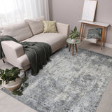 5' x 8' Gray and Ivory Abstract Power Loom Area Rug