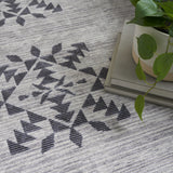 5' x 7' Gray and Ivory Geometric Power Loom Washable Area Rug