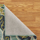 5' x 7' Green Wool Floral Hand Tufted Area Rug