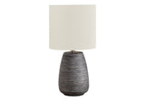 25" Black and Gold Concrete Cylinder Table Lamp With Black Drum Shade