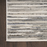 5' x 7' Cream Abstract Distressed Area Rug