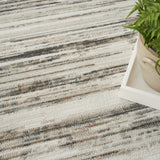 5' x 7' Cream Abstract Distressed Area Rug