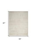 5' x 7' Cream Abstract Area Rug