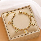 Keep The Faith Charm Bracelet - Love. Luck. Hope & Faith