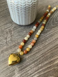 Neutral heart necklace