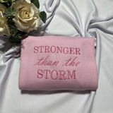 Stronger than the Storm embroidered sweatshirt; inspirational embroidered crewneck.